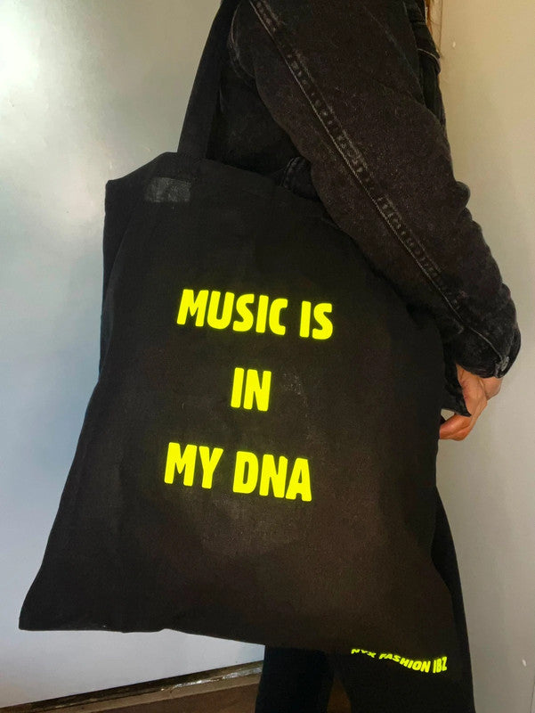 Bolso tote negro Music is in my DNA - Brilla en la oscuridad de Nyx Fashion Ibz